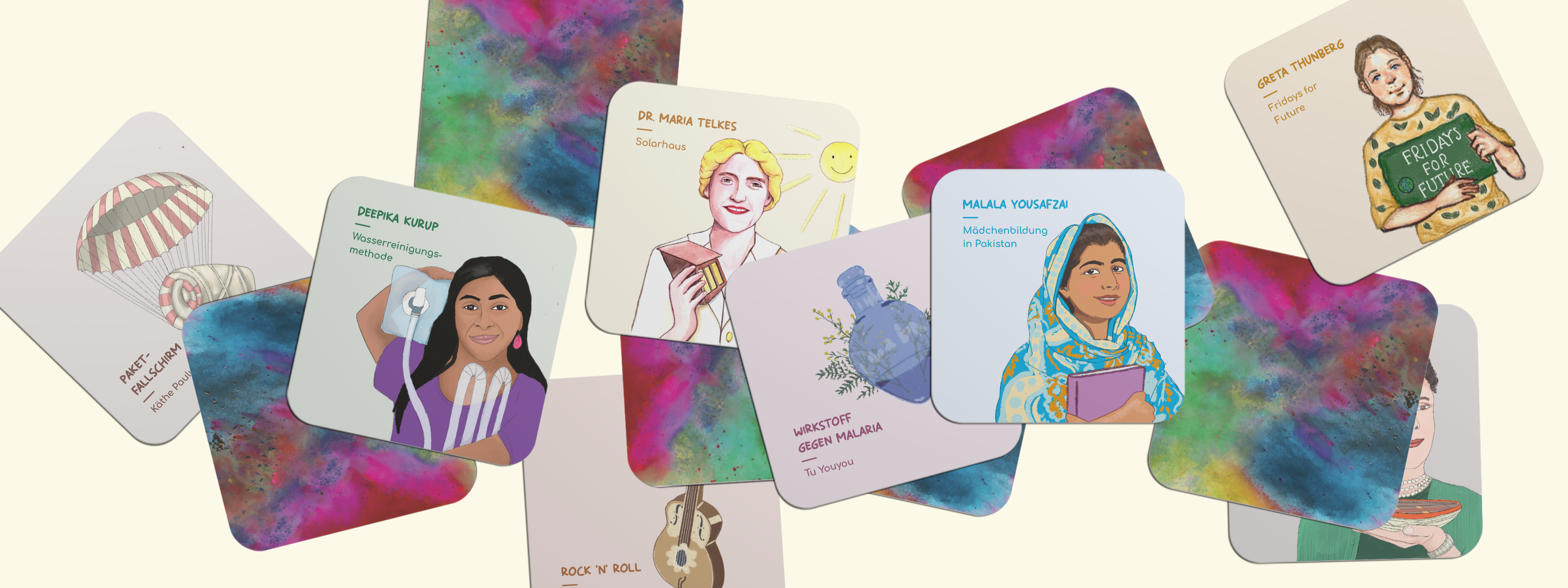 Spielkarten des "Erfinderinnen Memo" mit farbenfroher Rückseite, Illustrationen und Informationen zu inspirierenden Erfinderinnen.