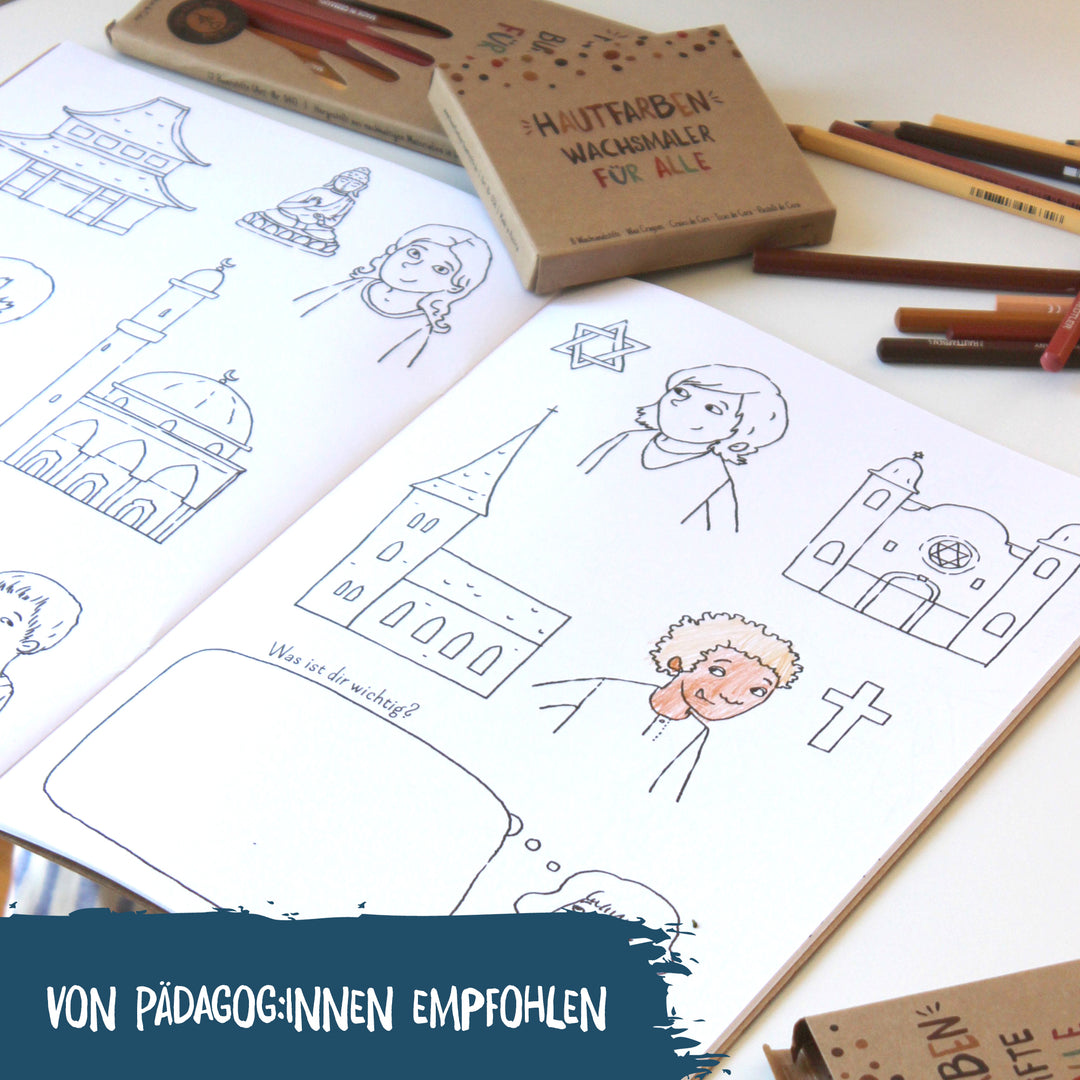 Seite aus dem Malbuch für alle mit Darstellung verschiedener Religionen. Daneben liegen die Buntstifte und Wachsmalstifte von Hautfarben.