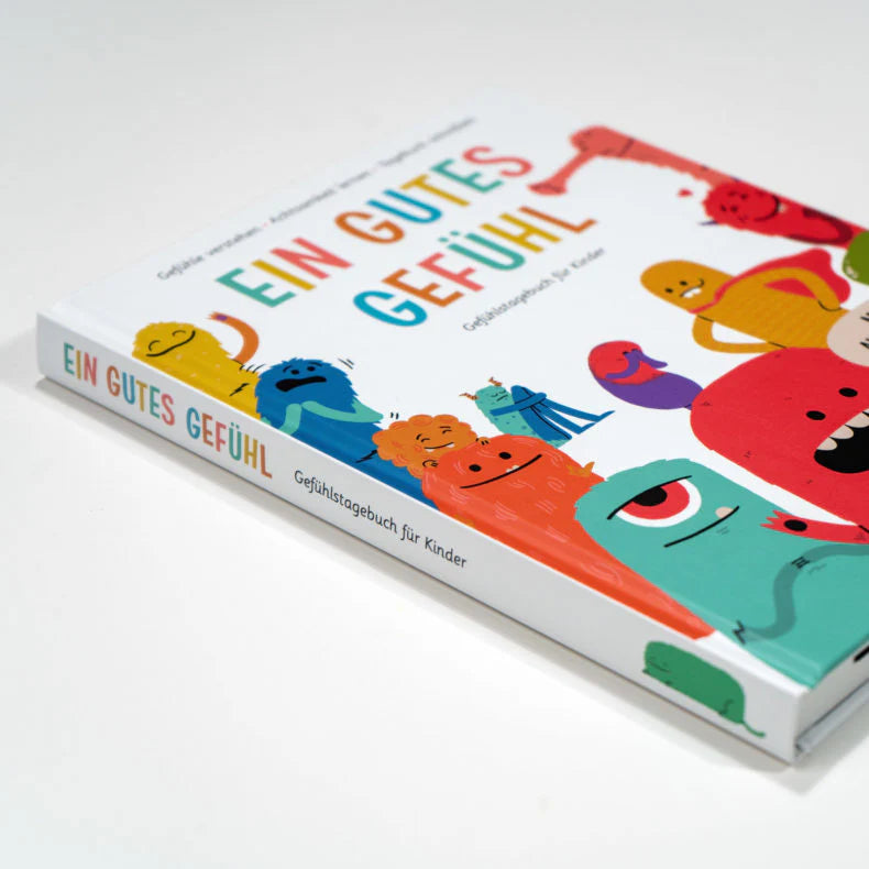 Hardcover-Ausgabe von „Ein gutes Gefühl“ mit bunter Illustration auf Cover und Rücken.