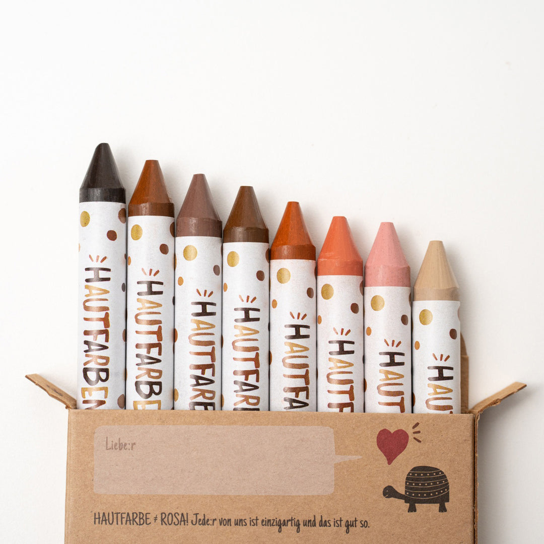 8 verschiedene Hautfarben Wachsmaler für Kinder zeigen aus Verpackung raus
